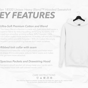 May include: A white Gildan 18500 Unisex Heavy Blend hooded sweatshirt hanging on a black hanger. The sweatshirt features a ribbed knit collar, spacious pockets, and a drawstring hood. The text on the image highlights key features and care instructions.