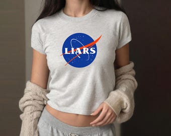 Funny Conspiracy Theory Baby Tee Shirt - Flat Earth Tshirt NASA Liars Parody Gift for Women