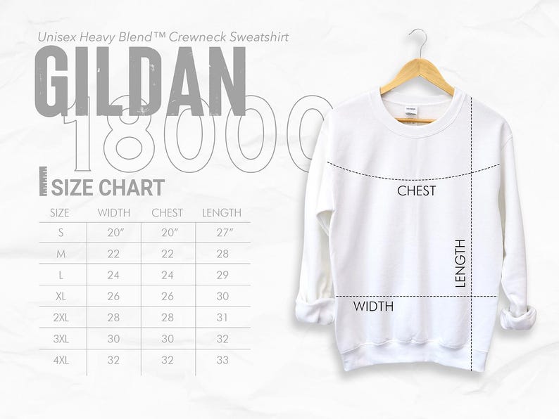 May include: A white Gildan 18000 crewneck sweatshirt displayed on a wooden hanger. The image includes a size chart with measurements in inches for width, chest, and length. The text "Unisex Heavy Blend Crewneck Sweatshirt" is visible.