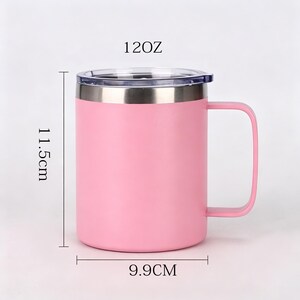 May include: A pink insulated travel mug with a handle and a clear lid. The mug is 11.5 cm tall and 9.9 cm wide, with a capacity of 120 oz. The mug has a stainless steel rim and handle.