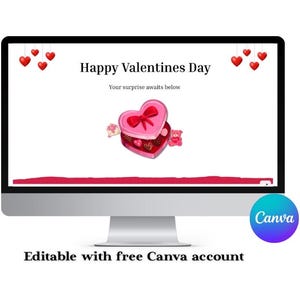 May include: A computer monitor shows a Valentine's Day graphic. The text reads "Happy Valentines Day" and "Your surprise awaits below." The graphic features red hearts and a heart-shaped box of chocolates with a pink bow.