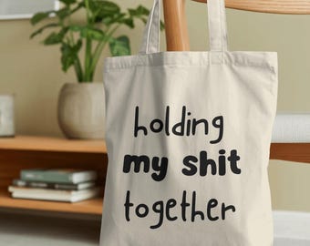 Bolso de tela divertido con el mensaje "Manteniendo mi mierda unida" / Viaje emocional / Chistes sobre salud mental / Juegos de palabras