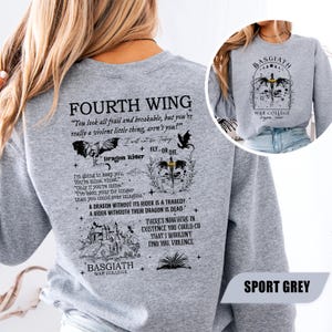 May include: Sport grey sweatshirt featuring the text "FOURTH WING" and other text with a dragon and castle graphic. The sweatshirt also has the text "BASGIATH WAR COLLEGE" and the words "FLY OR DIE".