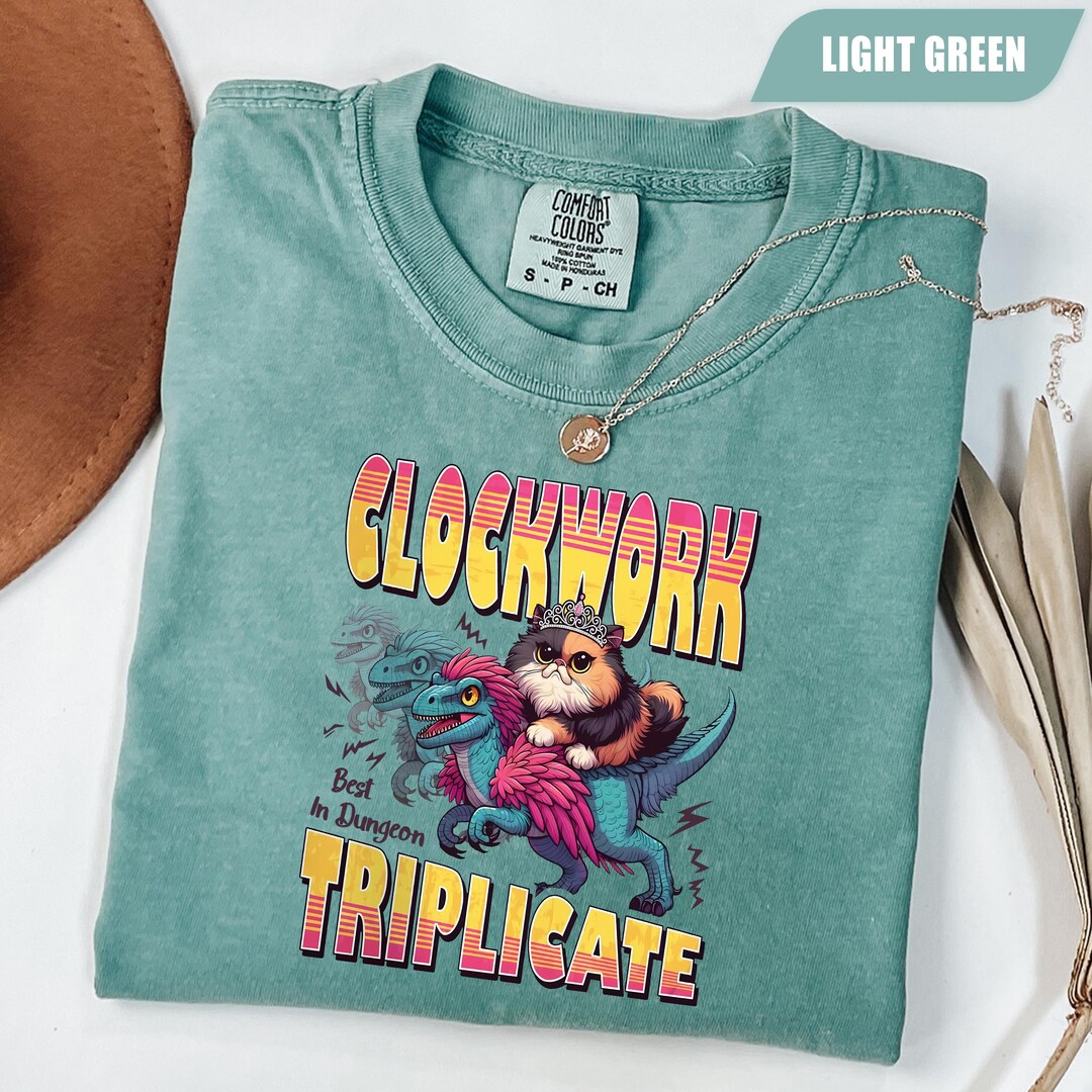 Clockwork Triplicate Retro Cat Dinosaur Tee, Dungeon Crawler Carl Tee ...