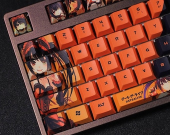 May include: A custom mechanical keyboard with orange keycaps and anime character artwork. The keyboard features a brown frame and a variety of character images on the keycaps. The text "DATEALIVE" is printed on one of the keys.