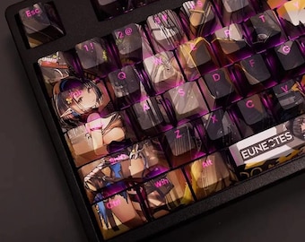 May include: Black mechanical keyboard with custom keycaps featuring anime-style illustrations. The keycaps have a translucent design with pink lettering and backlighting. The keyboard includes the text "EUNECTES" on one keycap.