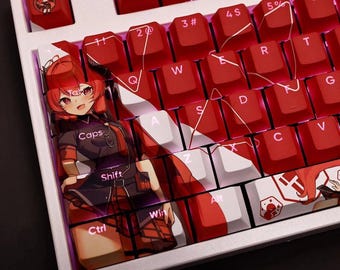 May include: A white and red mechanical keyboard with custom keycaps. The keycaps are red with white lettering, and some feature anime-style artwork. The keyboard has a compact layout and a white frame.