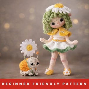 May include: Crocheted doll and snail with daisy accents. The doll has green hair, a yellow cape, and a white dress. The snail is orange and cream, holding a daisy. The text "BEGINNER FRIENDLY PATTERN" is at the bottom.