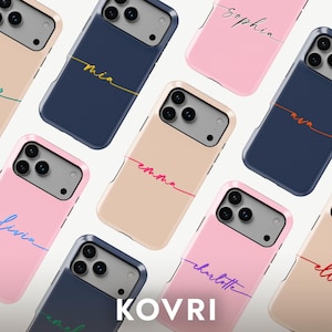 May include: A collection of personalized phone cases in various colors, including pink, navy blue, and beige. Each case features a name in a cursive font, with the brand name "KOVRi" at the bottom.
