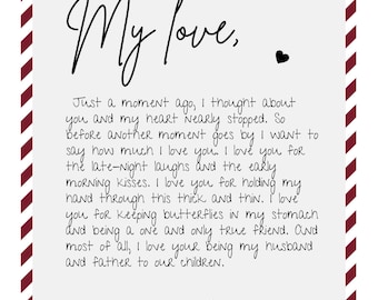 May include: A white card with a burgundy border and the words "My love," in elegant script. The card includes a handwritten love letter with the name "Jasmin" at the bottom, and a black "Love" emblem.