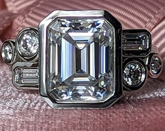 Modern Moissanite Engagement Ring Emerald Cut Bezel Set