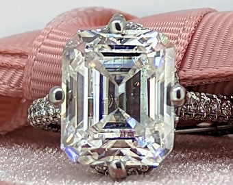 Hidden Halo Engagement Ring Emerald Cut Moissanite Ring NSEW Setting 7.87 ctw Bel Viaggio Designs