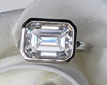 East West Set Moissanite Engagement Ring, Emerald Cut, Bezel Set, Modern Bridal Jewelry, Unique Wedding Ring