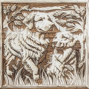 May include: A wooden plaque with a carved image of two white dogs in a grassy field. The dogs are facing each other and appear to be looking at each other. The plaque has a light brown wood grain and a dark brown border.