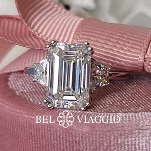 Emerald Moissanite Ring Gold Engagement Ring Trapezoid Accents Three Stone Ring 5.41 ctw Bel Viaggio Designs