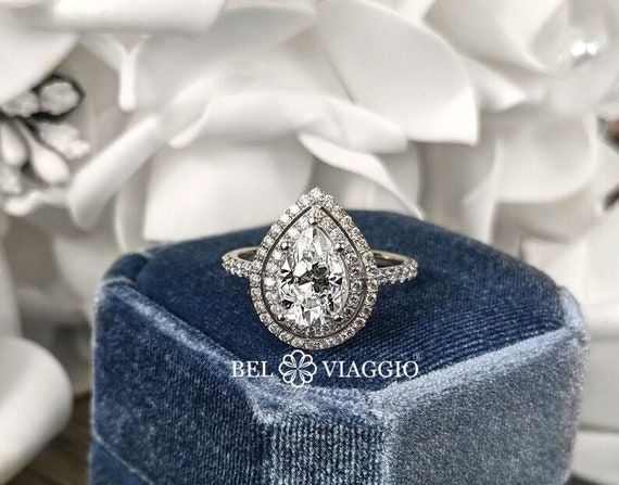 Moissanite pear halo ring discount