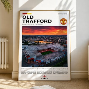 May include: A vertical poster featuring a high-angle aerial photograph of Old Trafford stadium in Manchester, England, at sunset. The text includes "OLD TRAFFORD," "SINCE 1910," and historical facts about the stadium, alongside the Manchester United crest.