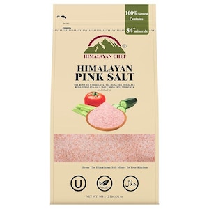 May include: A beige bag of Himalayan pink salt. The bag features the brand name "Himalayan Chef" and the words "Himalayan Pink Salt." The bag also displays images of a tomato, cucumber, and celery. The net weight is 2 lbs (908 g) and 32 oz.