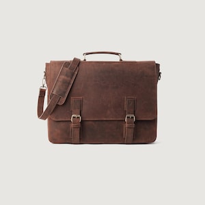 Vintageinspirerad bruntonad portfölj i kohud med pull-up-finish och laptopfack