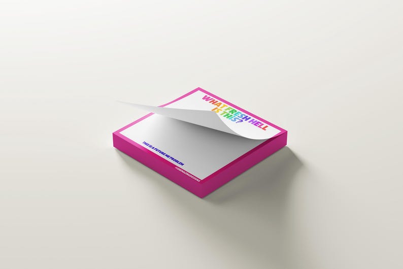 May include: A square notepad with a vibrant pink border and white pages. The top page is partially lifted, displaying the text "WHAT FRESH HELL IS THIS?" in rainbow hues. The bottom of the pad reads "THIS IS A FUTURE ME PROBLEM" in blue.
