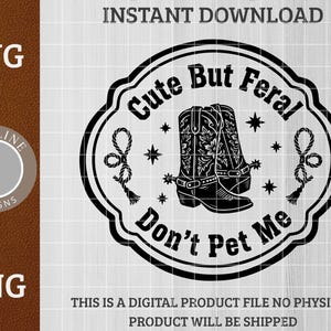 May include: A black and white digital design with cowboy boots, floral details, stars, and rope accents. The text says "Cute But Feral, Don't Pet Me". The design includes SVG and PNG file type options for digital download.