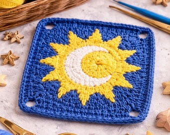 May include: A square, blue crochet piece featuring a yellow sun and a white crescent moon design. The crochet work is surrounded by gold scissors, wooden stars, and balls of yellow, blue, and white yarn. A candle and crochet hooks are also visible.