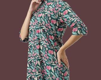 May include: A dark green shirt with a floral design featuring pink flowers and light blue leaves. The shirt has a mandarin collar and three-quarter sleeves. The fabric is lightweight, suitable for warmer weather. The shirt buttons down the front.