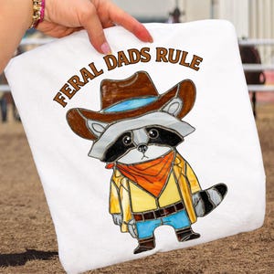 Feral Raccoon Dads Rule PNG, Cowboy Raccoon Dad Shirt Design, Stay Feral T-shirt Graphic, Western Father's Day Sublimation, Preppy Dad's