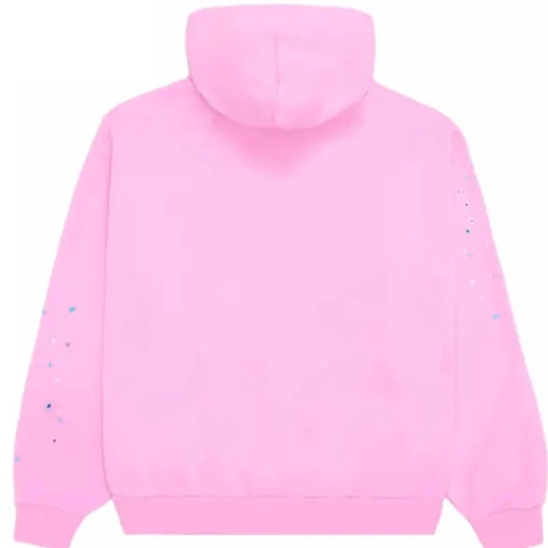 May include: A light pink hoodie with a hood and long sleeves. The sleeves have a splatter paint design in shades of blue and white. The hoodie is made of a soft material and is suitable for casual wear.
