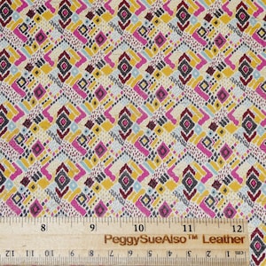 May include: A close-up of a fabric with a repeating geometric pattern in shades of pink, yellow, blue, and gray. The fabric is measured with a ruler that reads "PeggySueAlso™ Leather".