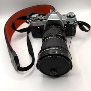 Vintage Canon AE-1 35mm Film Camera Bundle with FD 35-105mm Zoom Lens (Tested)