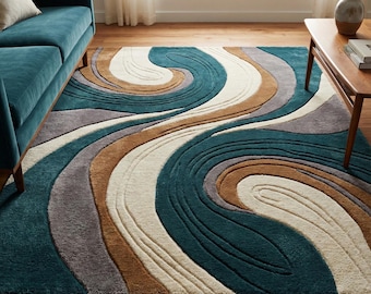 May include: A teal area rug with a swirling pattern in shades of white, brown, gray, and teal. The rug is rectangular and has a soft, textured appearance. The design resembles flowing water or abstract waves.