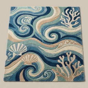 Top down view of ocean wave area rug featuring seashell and coral reef patterns with flowing coastal colors in blue teal and beige nautical style rug design