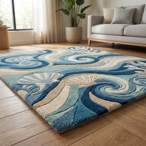 Detailed view of carved edge and sculpted coral motif on ocean themed area rug highlighting plush pile texture and coastal design craftsmanship