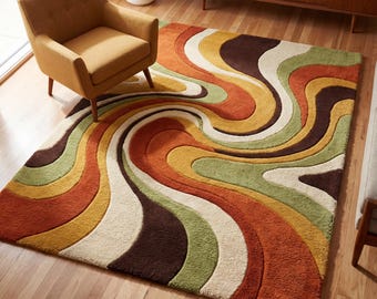 May include: A retro-style area rug with a swirling pattern in shades of orange, brown, yellow, green, and cream. The rug is rectangular and placed on a hardwood floor. A mustard-colored armchair sits nearby.
