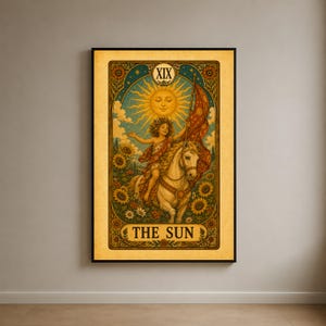 May include: A framed wall art print depicting The Sun tarot card, featuring a child with a floral crown riding a white horse. A large sun with a face shines above, with sunflowers in the background. The text XIX and THE SUN are clearly visible.