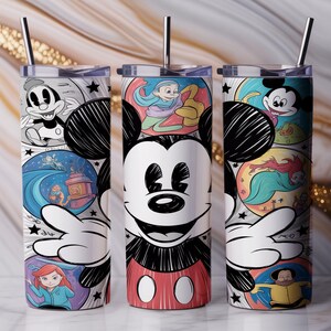 May include: Three stainless steel tumblers with a Mickey Mouse design. The tumblers feature a white background with colorful cartoon illustrations of Mickey Mouse and other Disney characters. Each tumbler has a silver straw.