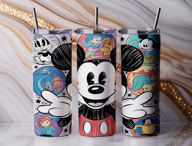 May include: Three stainless steel tumblers with a Mickey Mouse design. The tumblers feature a white background with colorful cartoon illustrations of Mickey Mouse and other Disney characters. Each tumbler has a silver straw.