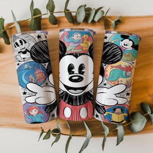 May include: Three stainless steel tumblers with colorful cartoon character designs. Each tumbler features a different Mickey Mouse design, with illustrations of various characters and scenes. The tumblers are cylindrical and have clear lids.