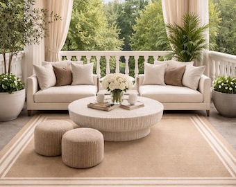Alfombra de lana beige con borde minimalista, moderna para sala de estar.