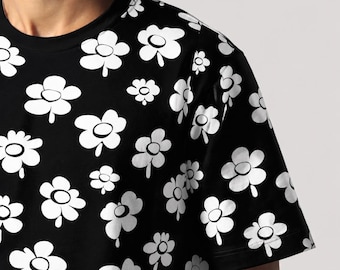 T-shirt unisex con stampa floreale bianca e nera, design minimalista con grafica integrale.