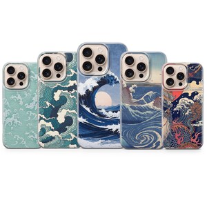 May include: A collection of five phone cases featuring Japanese wave art in shades of blue, teal, and white. Each case showcases a different design, including a large wave, a rising sun, and a dragon. The cases have a glossy finish and are designed for smartphones.