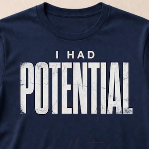 May include: A set of three ceramic mugs with a speckled, matte finish. The mugs are in shades of cream, light gray, and dark gray. Each mug has a simple, modern design and a rounded handle.