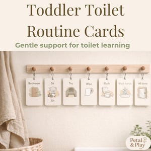 May include: A set of toddler toilet routine cards hanging on a wooden rack. The cards feature illustrations and text such as "Bathroom," "Sit," "Try," "Wipe," "Flush," "Wash hands," and "All done." The text "Toddler Toilet Routine Cards" is at the top.