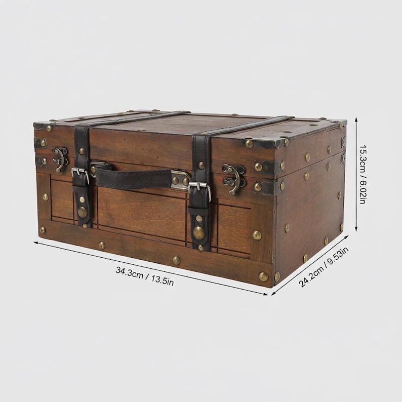 May include: A rectangular wooden trunk with a dark brown finish, black leather straps, and metal hardware. The trunk measures 13.5 inches long, 9.53 inches wide, and 6.02 inches high. It features a handle and decorative metal studs.