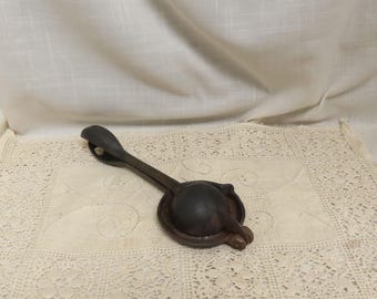 VENTA Exprimidor de limón de hierro fundido antiguo