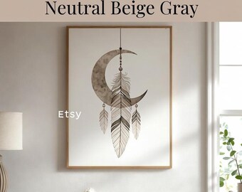 May include: Boho wall art set of 18. A framed print features a crescent moon and feathers in neutral beige and grey tones. The Etsy logo is visible in the lower left corner. The artwork is displayed above a beige sofa.