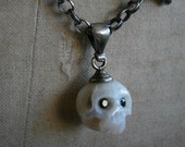Carved Pearl Skull Necklace with real Sapphires