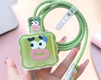 Protector de cable de cargador con diseño de dibujos animados: funda de TPU para la cabeza, protector de cable USB, hebilla enrolladora.