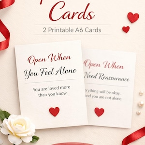 May include: Two printable A6 cards with the text "Open When Cards". One card reads "Open When You Feel Alone" and the other reads "Open When You Need Reassurance". Red hearts and ribbon accents decorate the cards.
